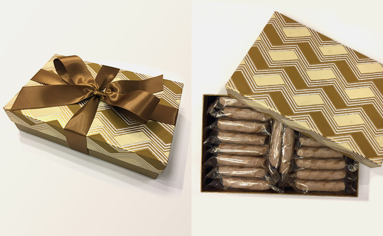 ビッグアイランド・キャンディーズ<br />
シナモンホワイトディップマカデミアナッツ（17個入）＄17