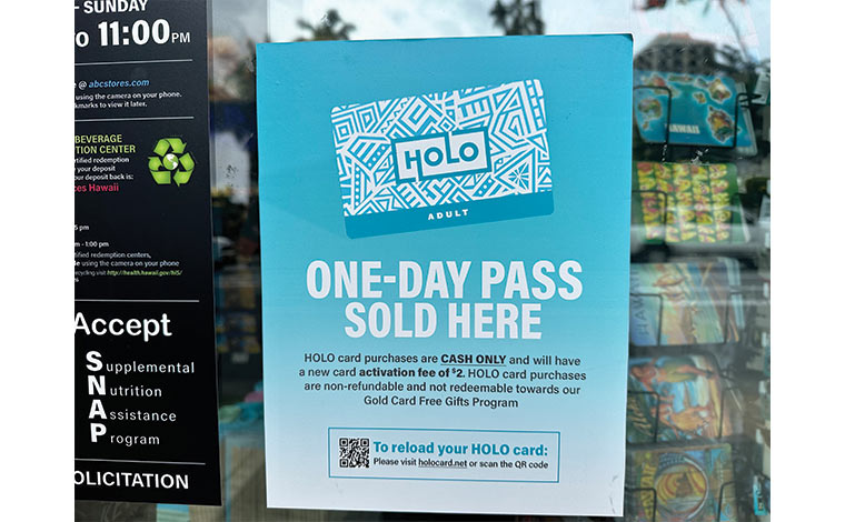 ワンデーパスのHoloカードを購入できるABCストアにはポスターが貼ってある